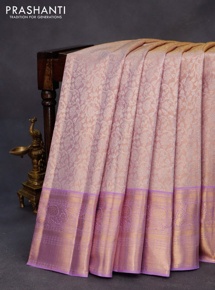 Kanchipuram tissue silk saree dual shade of lavender with allover silver zari woven brocade weaves and zari woven border