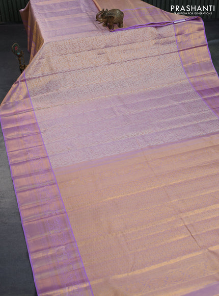 Kanchipuram tissue silk saree dual shade of lavender with allover silver zari woven brocade weaves and zari woven border