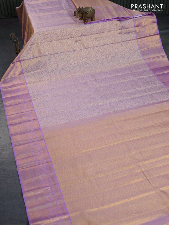 Kanchipuram tissue silk saree dual shade of lavender with allover silver zari woven brocade weaves and zari woven border