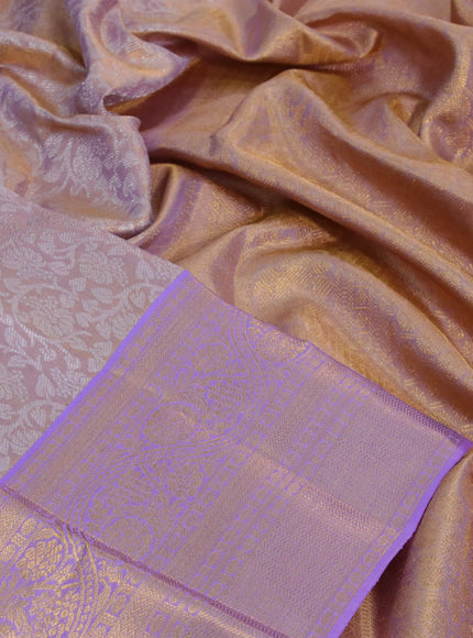 Kanchipuram tissue silk saree dual shade of lavender with allover silver zari woven brocade weaves and zari woven border