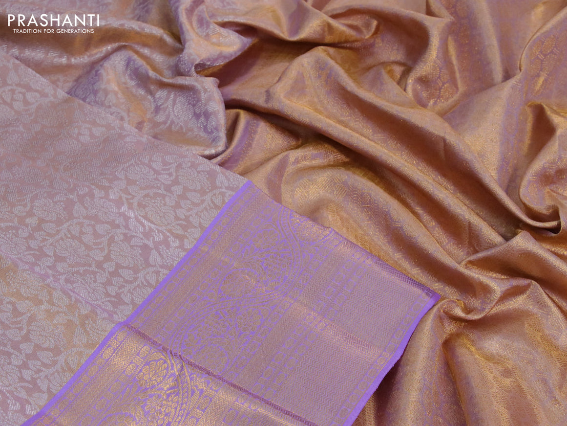 Kanchipuram tissue silk saree dual shade of lavender with allover silver zari woven brocade weaves and zari woven border