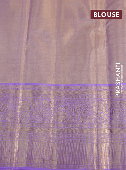 Kanchipuram tissue silk saree dual shade of lavender with allover silver zari woven brocade weaves and zari woven border