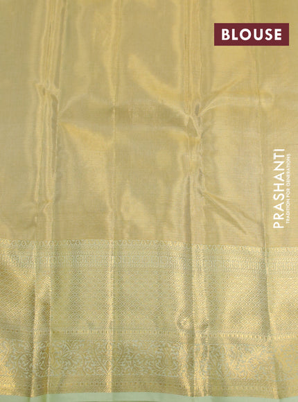 Kanchipuram tissue silk saree gold and pista green with allover zari woven brocade weaves and long zari woven border