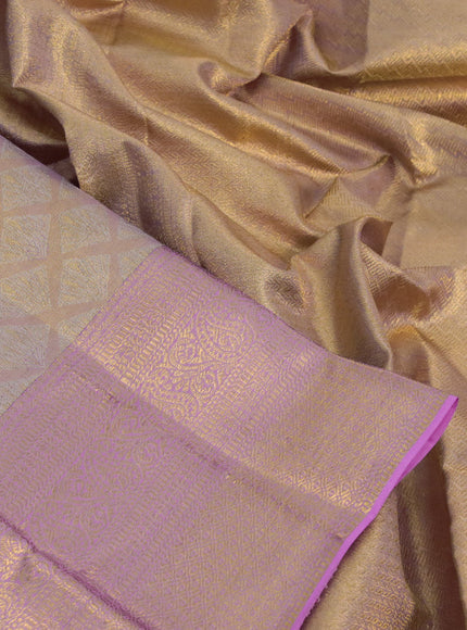 Kanchipuram tissue silk saree dual shade of peach and light pink with allover silver zari woven geometric brocade weaves and long zari woven border