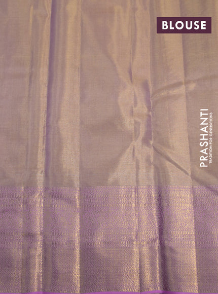 Kanchipuram tissue silk saree dual shade of peach and light pink with allover silver zari woven geometric brocade weaves and long zari woven border