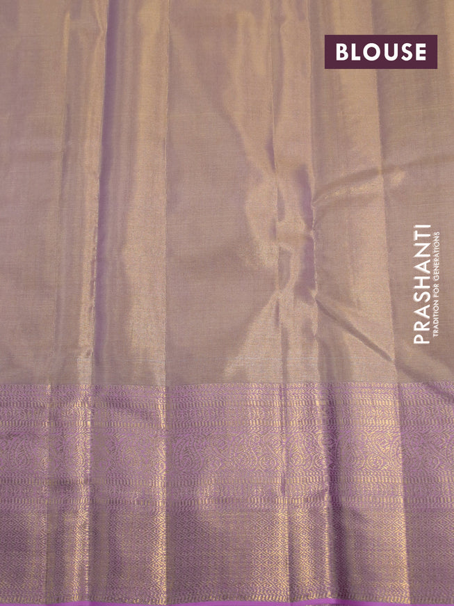 Kanchipuram tissue silk saree dual shade of peach and light pink with allover silver zari woven geometric brocade weaves and long zari woven border