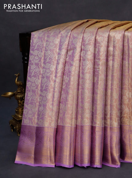 Kanchipuram tissue silk saree dual shade of lavender and lavender with allover silver zari woven brocade weaves and zari woven border