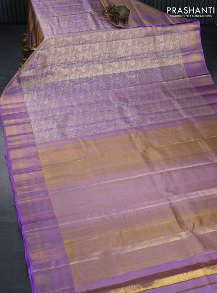 Kanchipuram tissue silk saree dual shade of lavender and lavender with allover silver zari woven brocade weaves and zari woven border