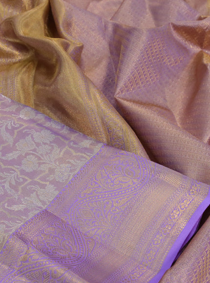 Kanchipuram tissue silk saree dual shade of lavender and lavender with allover silver zari woven brocade weaves and zari woven border