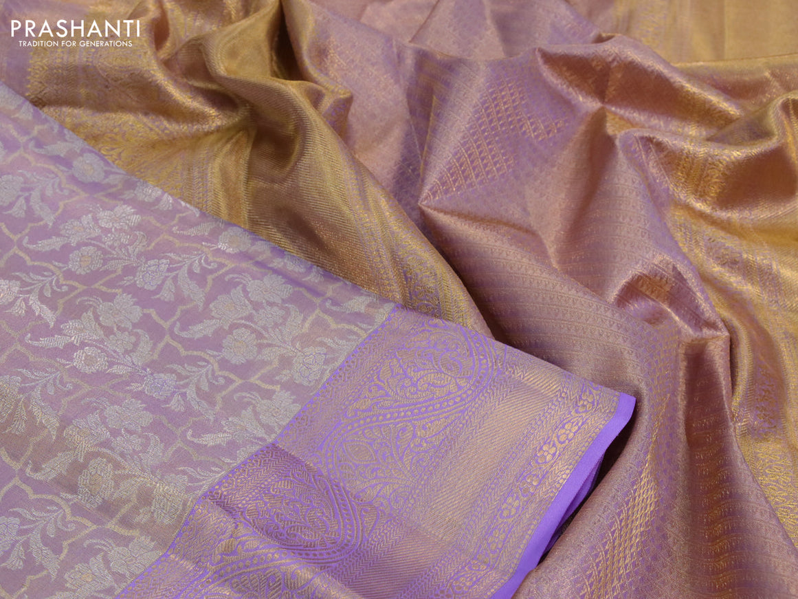 Kanchipuram tissue silk saree dual shade of lavender and lavender with allover silver zari woven brocade weaves and zari woven border