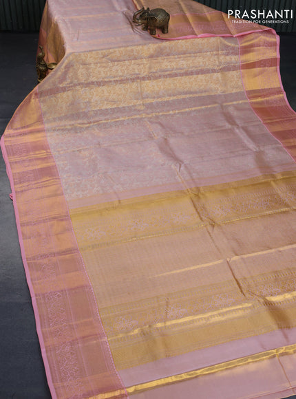 Kanchipuram tissue silk saree dual shade of peach and peach pink with allover silver zari woven brocade weaves and long zari woven border