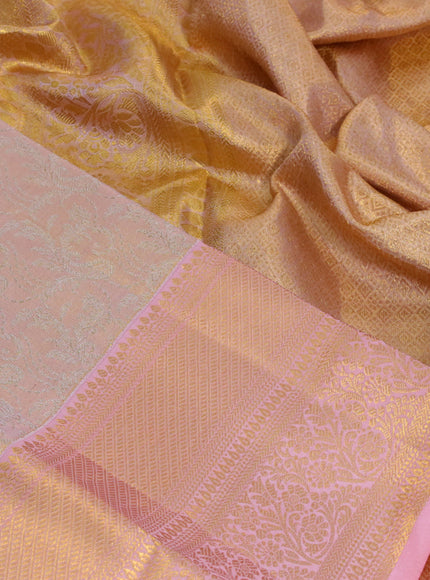 Kanchipuram tissue silk saree dual shade of peach and peach pink with allover silver zari woven brocade weaves and long zari woven border