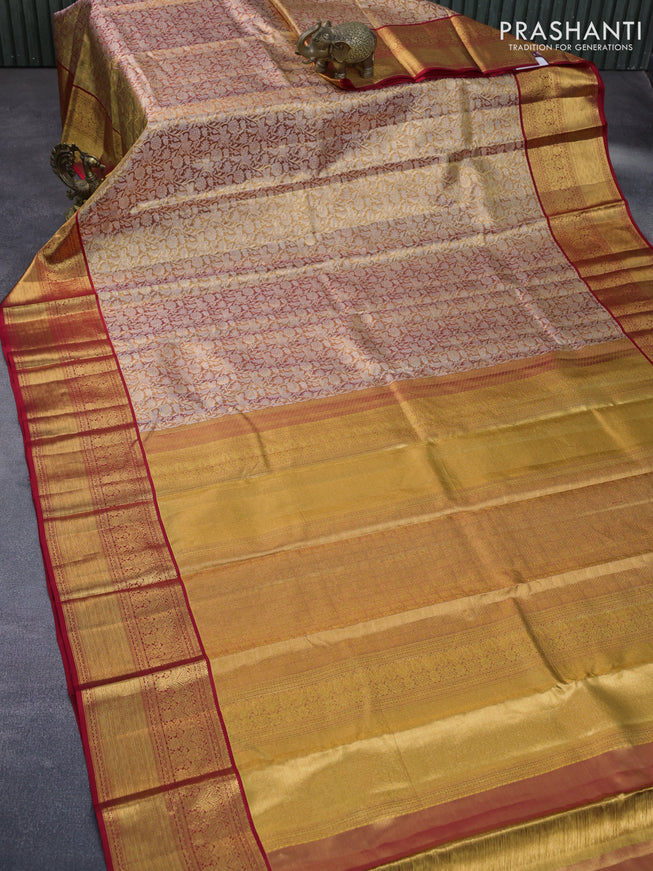 Kanchipuram tissue silk saree dual shade of reddish gold and red with allover zari woven brocade weaves and long zari woven border