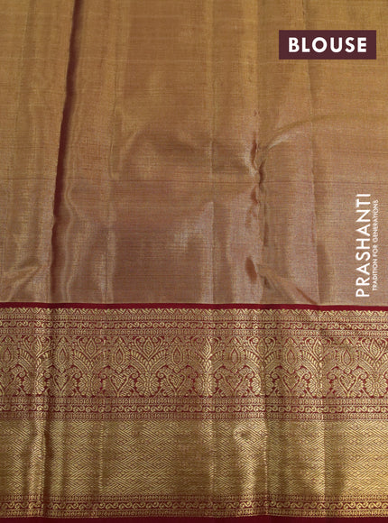 Kanchipuram tissue silk saree dual shade of reddish gold and red with allover zari woven brocade weaves and long zari woven border