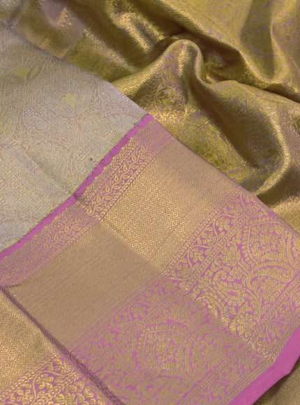 Kanchipuram tissue silk saree dual shade of gold and pink with allover silver zari woven brocade weaves and long zari woven border