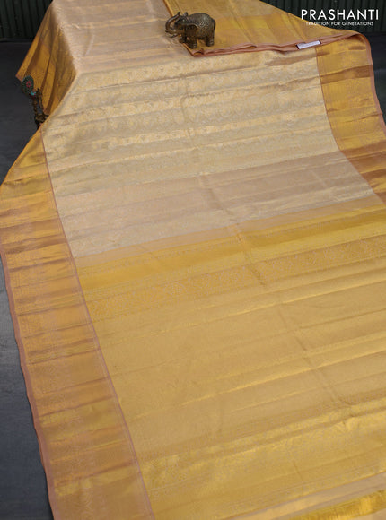 Kanchipuram tissue silk saree dual shade of gold with allover silver zari woven brocade weaves and long zari woven border