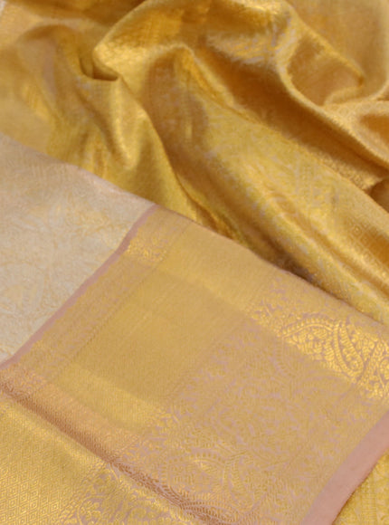 Kanchipuram tissue silk saree dual shade of gold with allover silver zari woven brocade weaves and long zari woven border