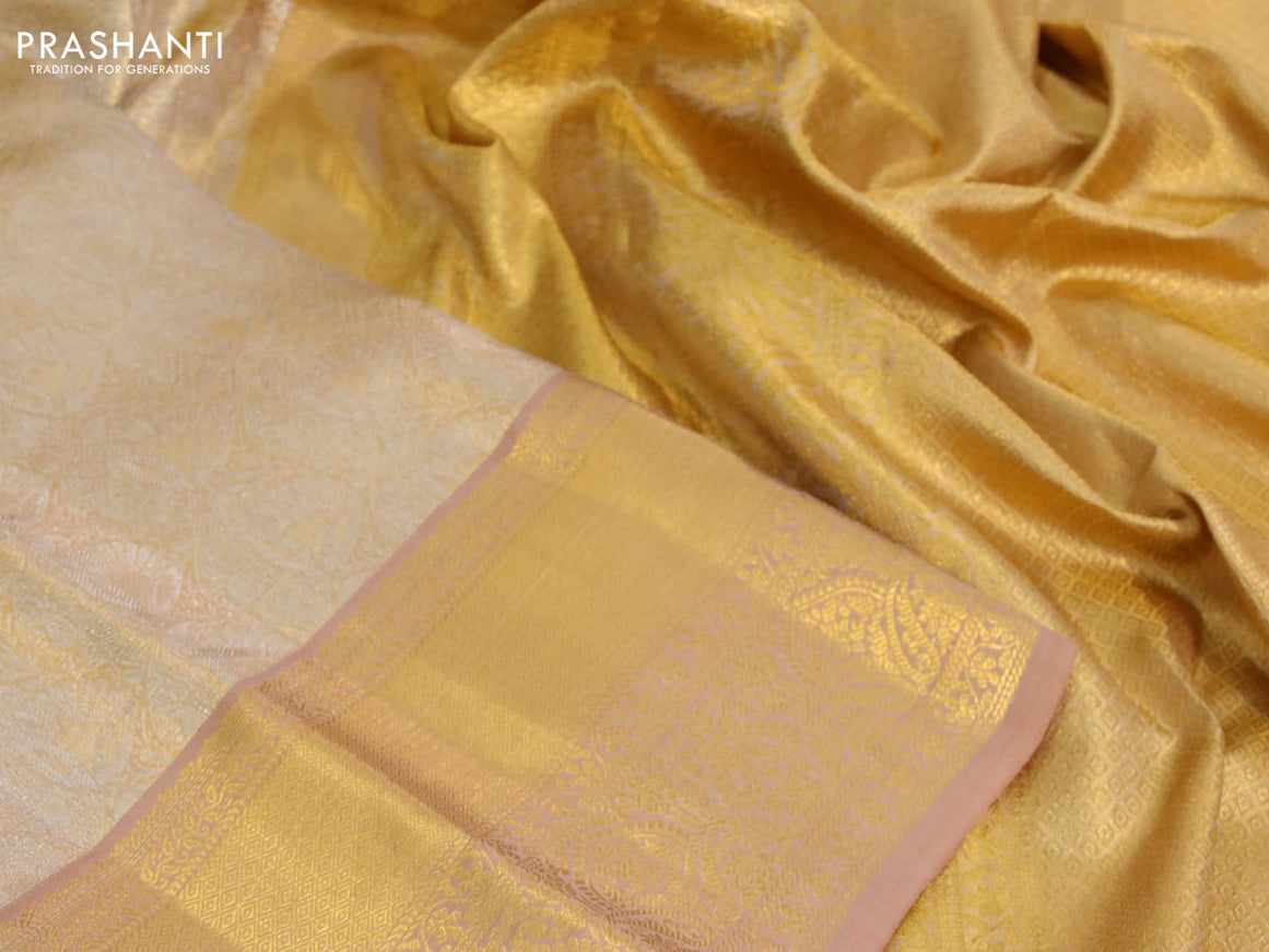 Kanchipuram tissue silk saree dual shade of gold with allover silver zari woven brocade weaves and long zari woven border