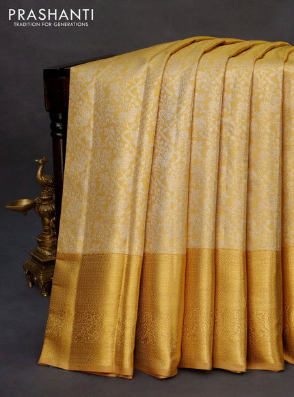 Kanchipuram tissue silk saree gold with allover silver zari woven brocade weaves and zari woven border