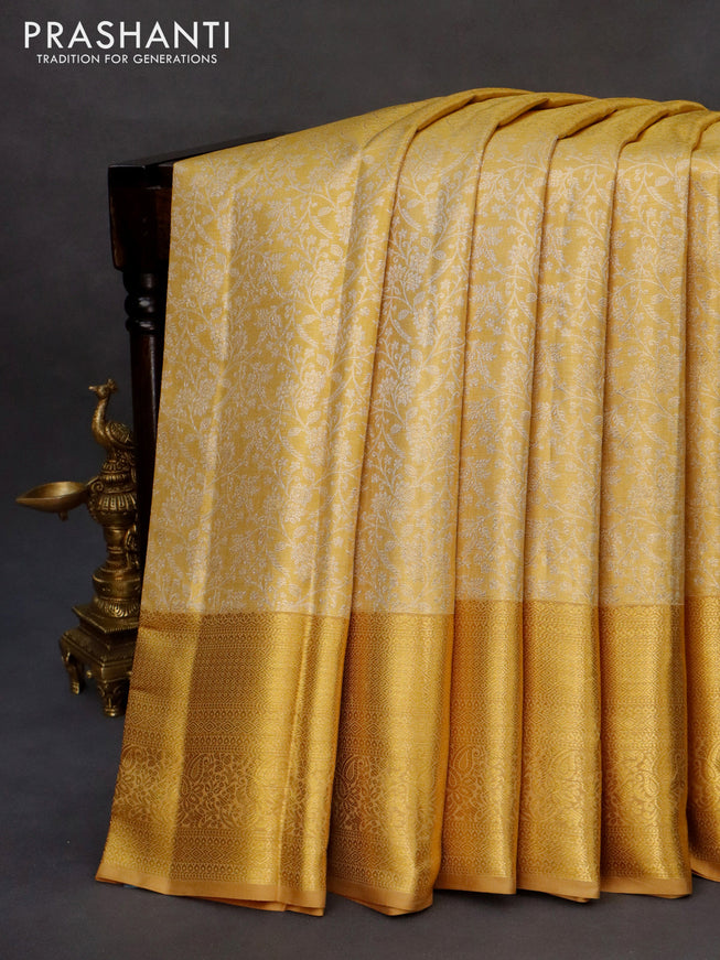 Kanchipuram tissue silk saree gold with allover silver zari woven brocade weaves and zari woven border