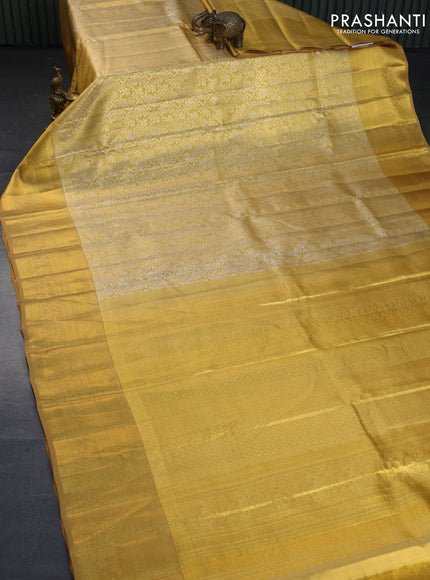 Kanchipuram tissue silk saree gold with allover silver zari woven brocade weaves and zari woven border