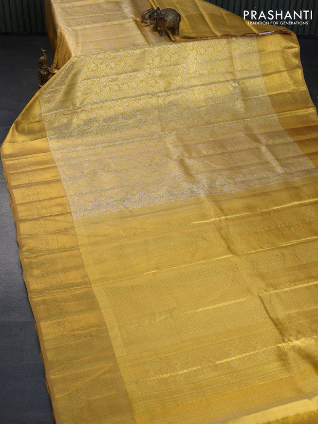 Kanchipuram tissue silk saree gold with allover silver zari woven brocade weaves and zari woven border