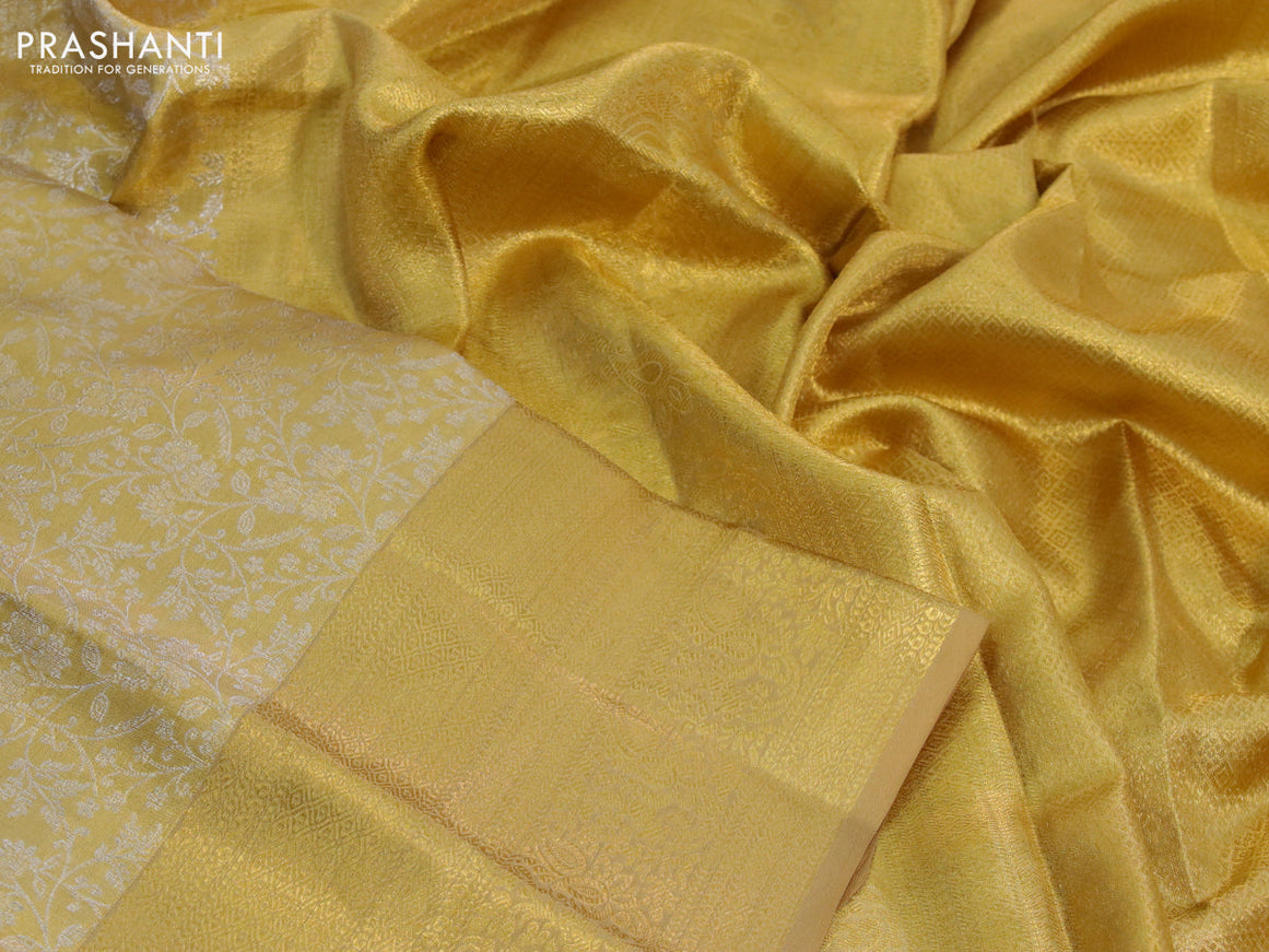 Kanchipuram tissue silk saree gold with allover silver zari woven brocade weaves and zari woven border