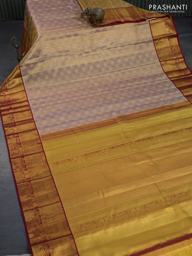 Kanchipuram tissue silk saree dual shade of gold and red with allover silver zari woven brocade weaves and zari woven border