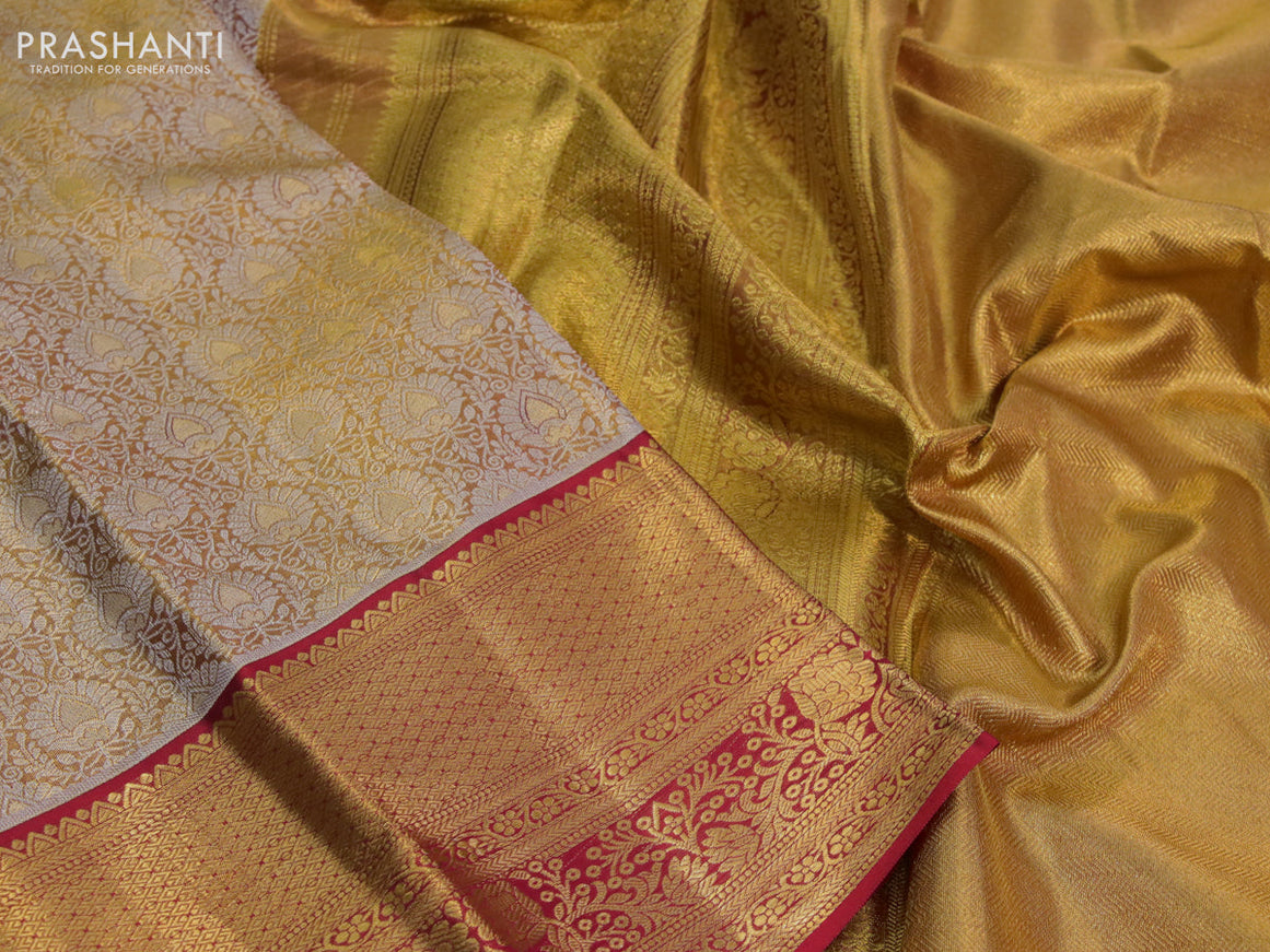 Kanchipuram tissue silk saree dual shade of gold and red with allover silver zari woven brocade weaves and zari woven border