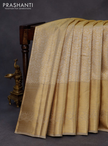 Kanchipuram tissue silk saree gold and beige with allover silver zari woven brocade weaves and zari woven border