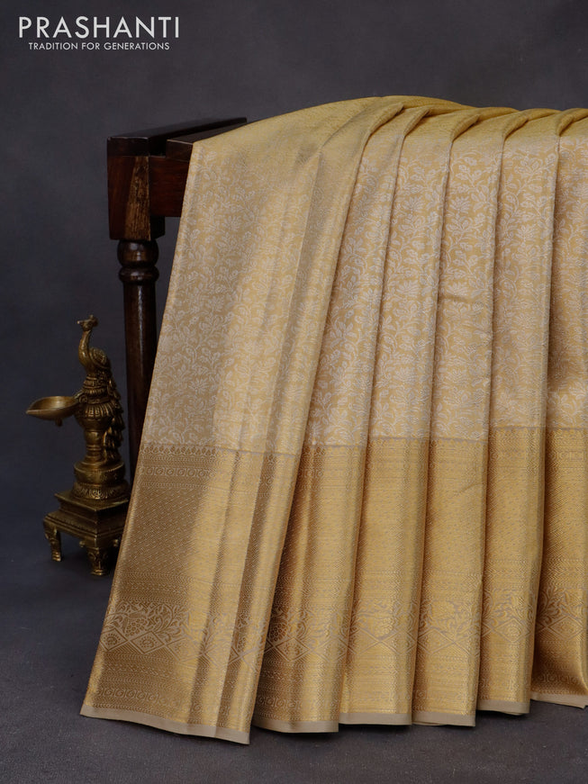 Kanchipuram tissue silk saree gold and beige with allover silver zari woven brocade weaves and zari woven border