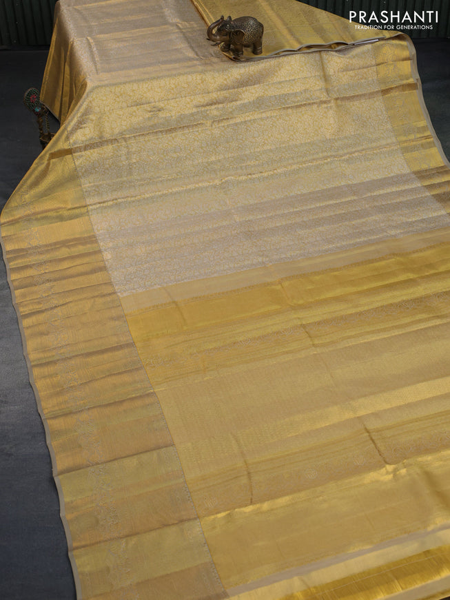 Kanchipuram tissue silk saree gold and beige with allover silver zari woven brocade weaves and zari woven border