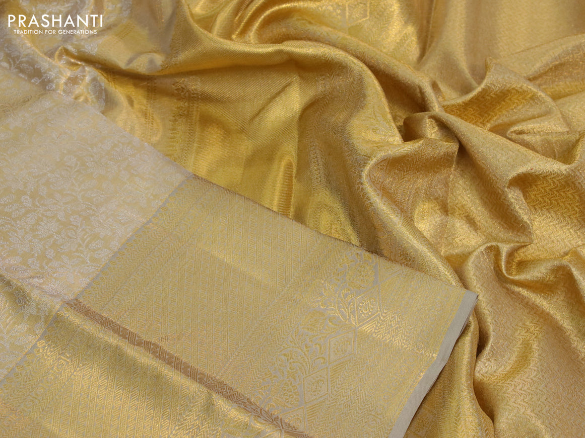 Kanchipuram tissue silk saree gold and beige with allover silver zari woven brocade weaves and zari woven border