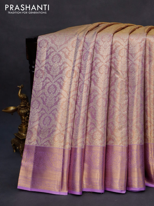 Kanchipuram tissue silk saree dual shade of lavender with allover silver zari woven brocade weaves and zari woven border