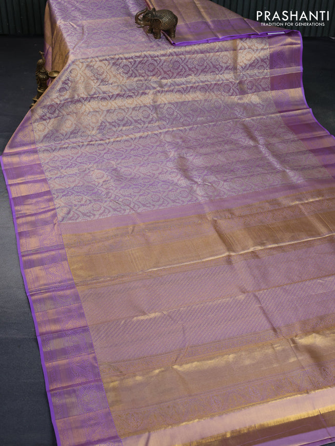 Kanchipuram tissue silk saree dual shade of lavender with allover silver zari woven brocade weaves and zari woven border