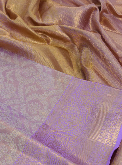 Kanchipuram tissue silk saree dual shade of lavender with allover silver zari woven brocade weaves and zari woven border