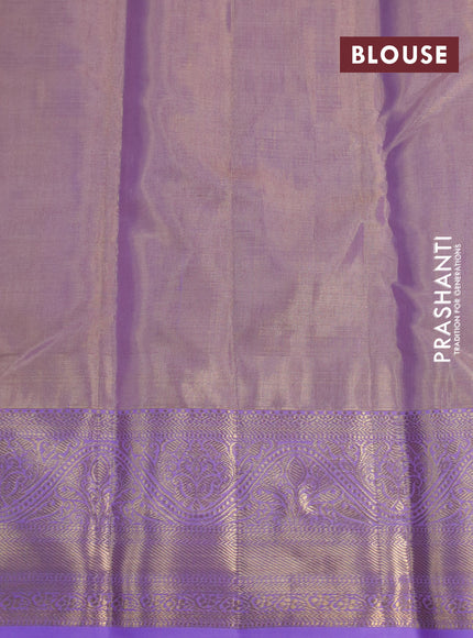 Kanchipuram tissue silk saree dual shade of lavender with allover silver zari woven brocade weaves and zari woven border