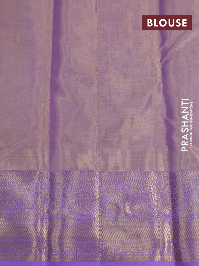 Kanchipuram tissue silk saree dual shade of lavender with allover silver zari woven brocade weaves and zari woven border