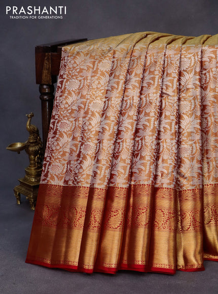 Kanchipuram tissue silk saree dual shade of goldish red and red with allover silver zari woven floral brocade weaves and long zari woven border