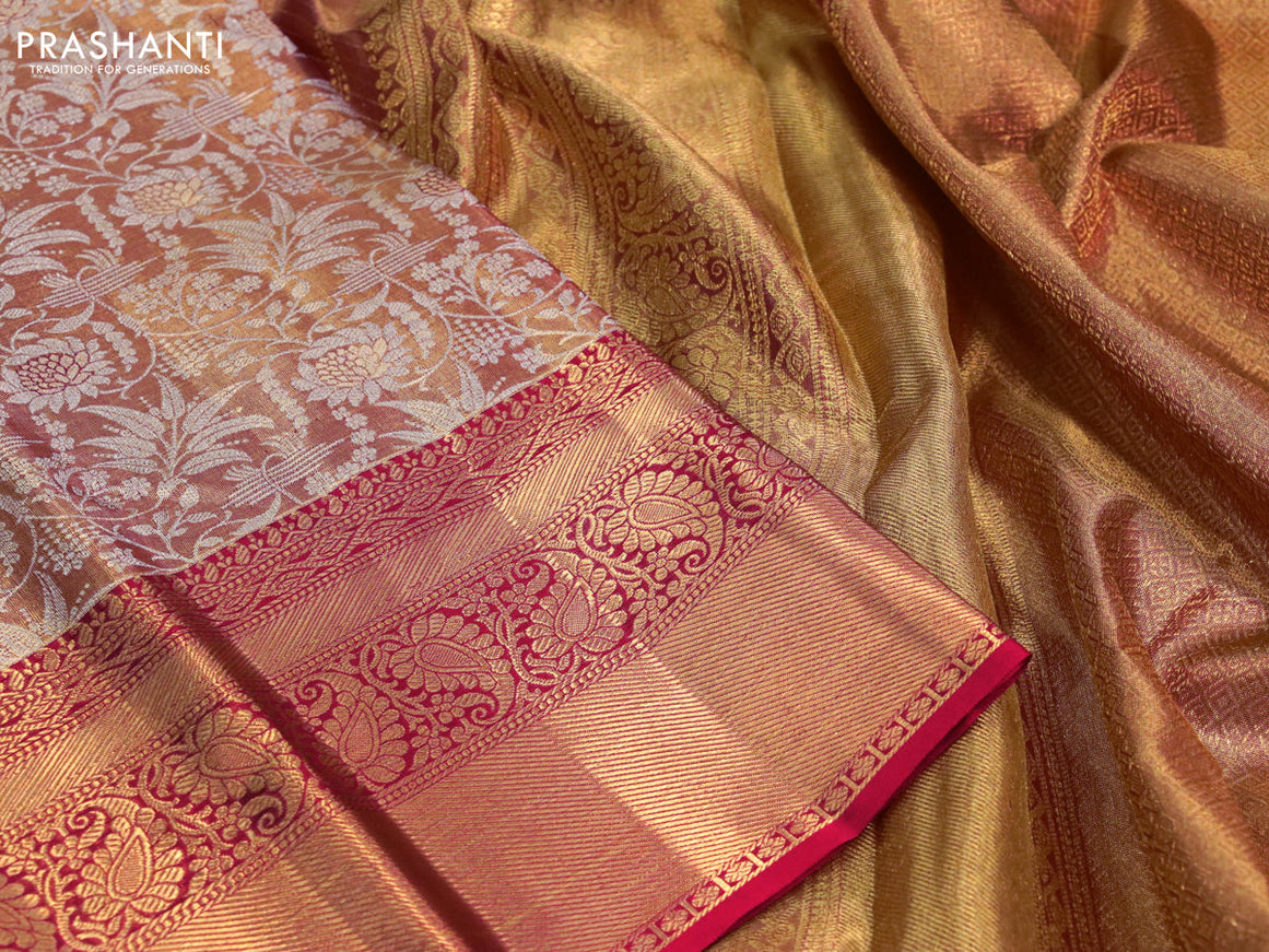 Kanchipuram tissue silk saree dual shade of goldish red and red with allover silver zari woven floral brocade weaves and long zari woven border