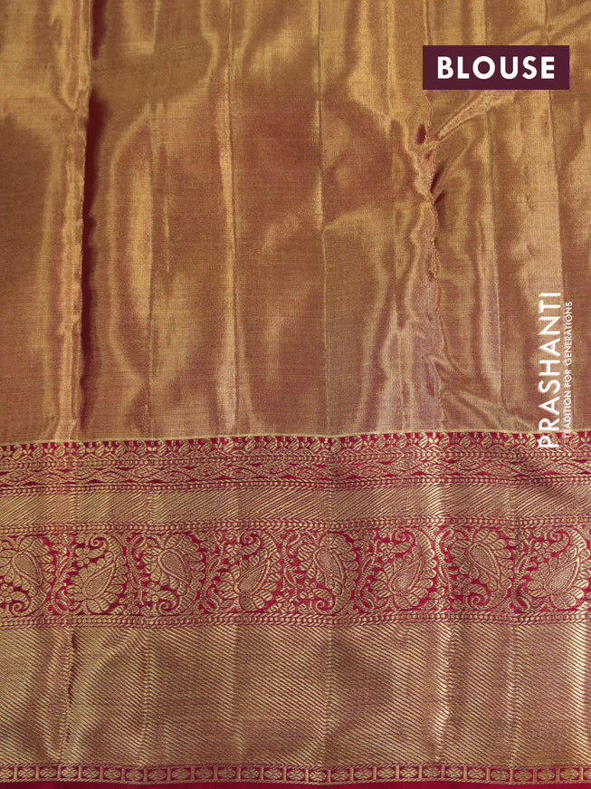 Kanchipuram tissue silk saree dual shade of goldish red and red with allover silver zari woven floral brocade weaves and long zari woven border