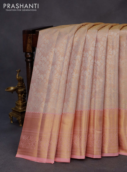 Kanchipuram tissue silk saree dual shade of peach and peach pink with allover silver zari woven brocade weaves and long zari woven border