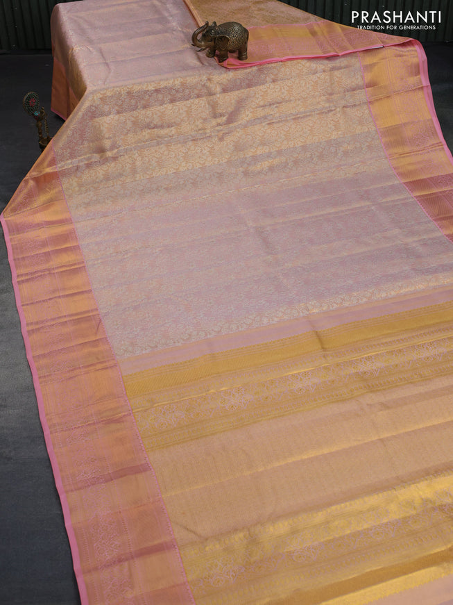 Kanchipuram tissue silk saree dual shade of peach and peach pink with allover silver zari woven brocade weaves and long zari woven border