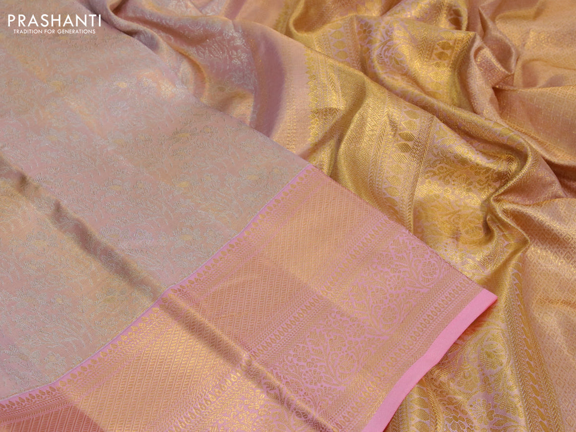 Kanchipuram tissue silk saree dual shade of peach and peach pink with allover silver zari woven brocade weaves and long zari woven border