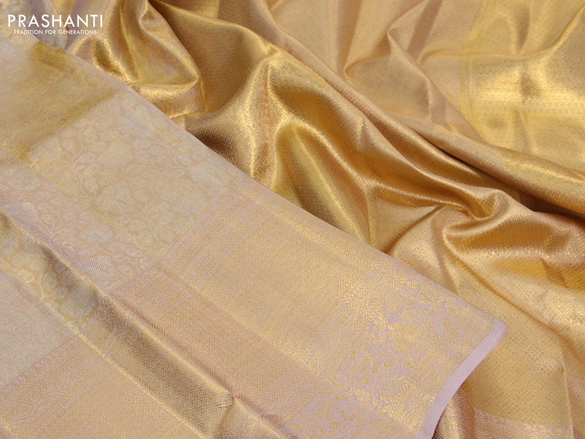 Kanchipuram tissue silk saree gold and beige with allover zari woven brocade weaves and long zari woven border