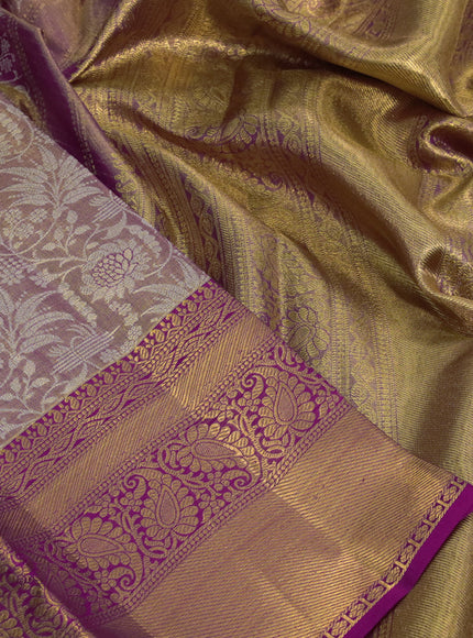 Kanchipuram tissue silk saree dual shade of gold and pink with allover silver zari woven brocade weaves and long zari woven border