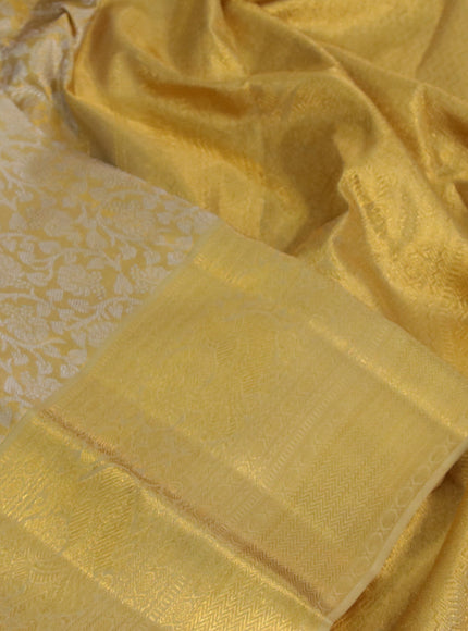 Kanchipuram tissue silk saree gold and sandal with allover silver zari woven brocade weaves and long zari woven border