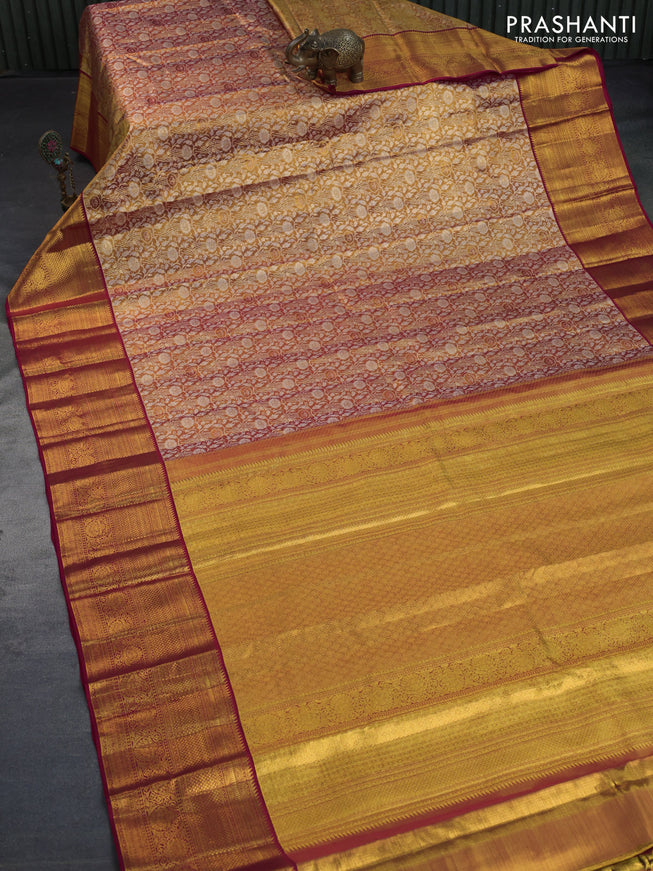 Kanchipuram tissue silk saree dual shade of gold and red with allover silver zari woven brocade weaves and zari woven border