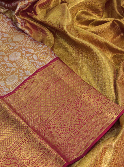 Kanchipuram tissue silk saree dual shade of gold and red with allover silver zari woven brocade weaves and zari woven border