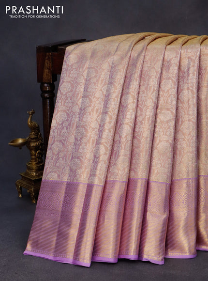 Kanchipuram tissue silk saree dual shade of lavender with allover silver zari woven brocade weaves and zari woven border